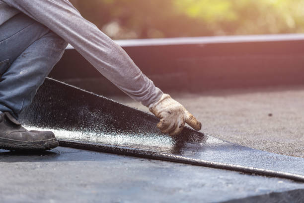 Professional Basement Waterproofing technician working in Clyde, NC